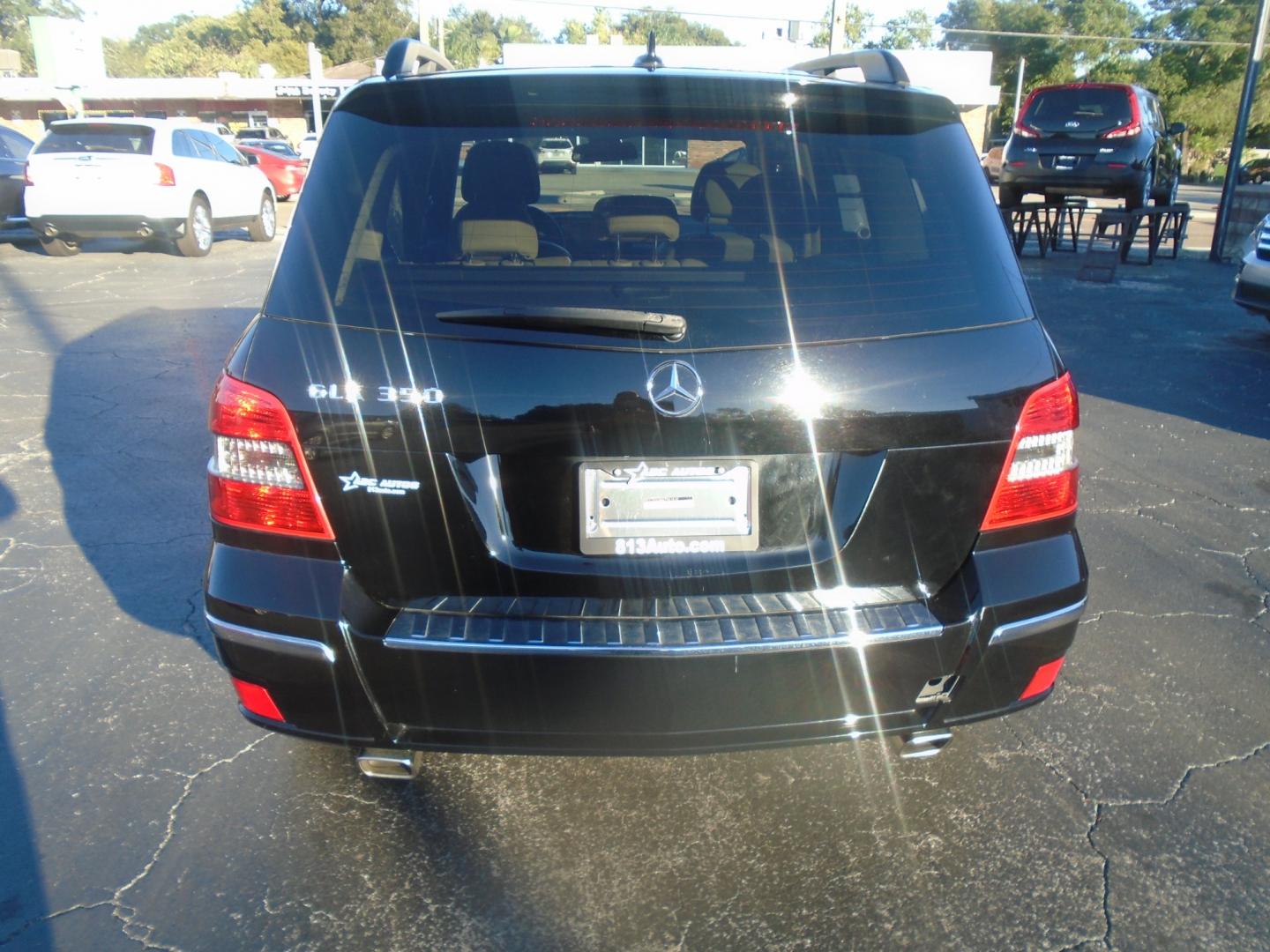 2012 Black /Beige Mercedes-Benz GLK-Class GLK350 (WDCGG5GB8CF) with an 3.5L V6 DOHC 24V engine, 7-Speed Automatic transmission, located at 6112 N Florida Avenue, Tampa, FL, 33604, (888) 521-5131, 27.954929, -82.459534 - Photo#4